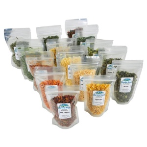 A variety of colorful food bags featuring the Harmony House Vegetable Sampler.