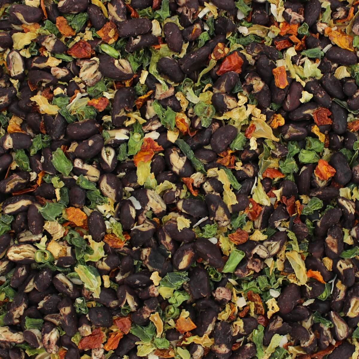 A close up of a pile of black beans and spices from the Harmony House Soup and Chili Mix Sampler.