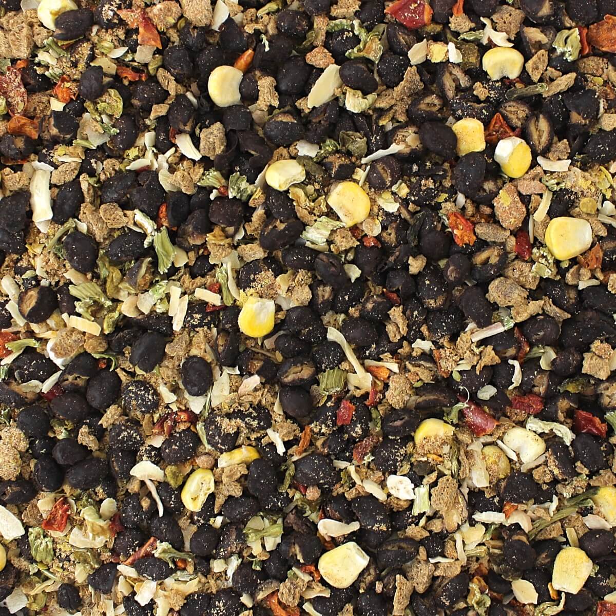 A close up of a mixture of black seeds and nuts from the Harmony House Value Soup Variety Pack.