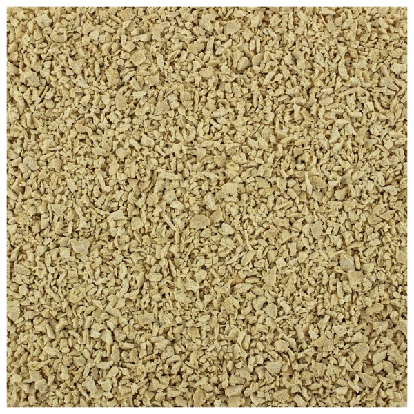 A close up image of a beige textured background featuring the Harmony House Deluxe Plant-Based Protein Sampler.
