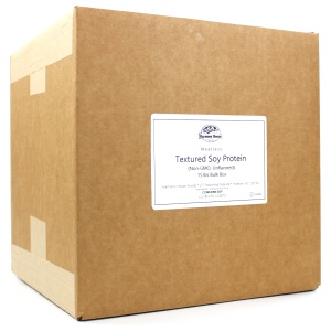 A brown box with a label on it containing Unflavored Harmony House Textured Soy Protein (Non-GMO) weighing 15 lbs, which ships in 1-2 weeks.