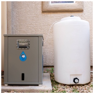 A water heater next to a tank in front of a house can also be used for emergency food storage.