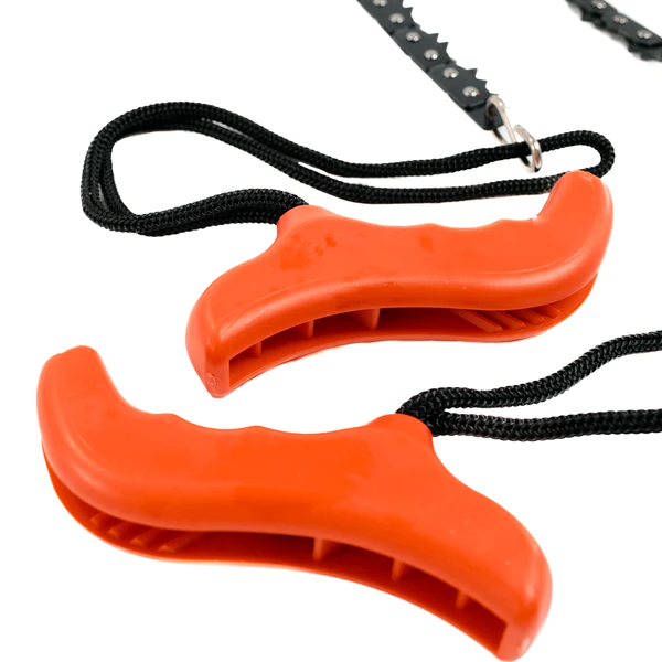 A pair of orange and black plastic handles on a white background, perfect for Frog & Co.'s Pocket Chainsaw.