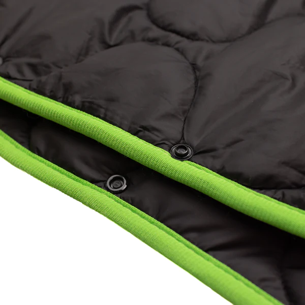 A close up of a black and green sleeping bag by Frog & Co.