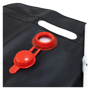 A Solar Shower Bag with a red handle.