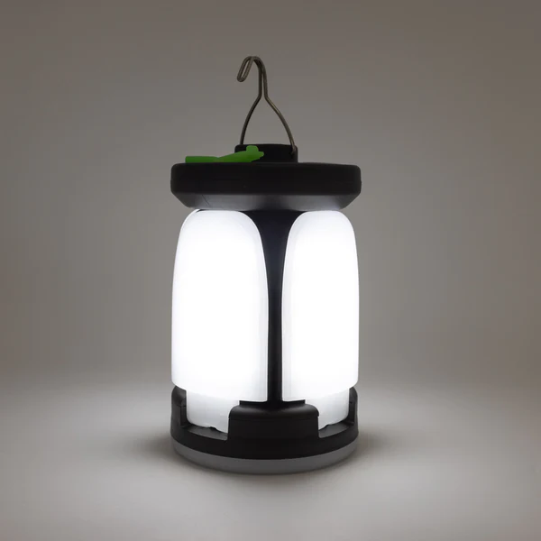 A black lantern with a green light on it, available for shipment in 1-2 weeks.